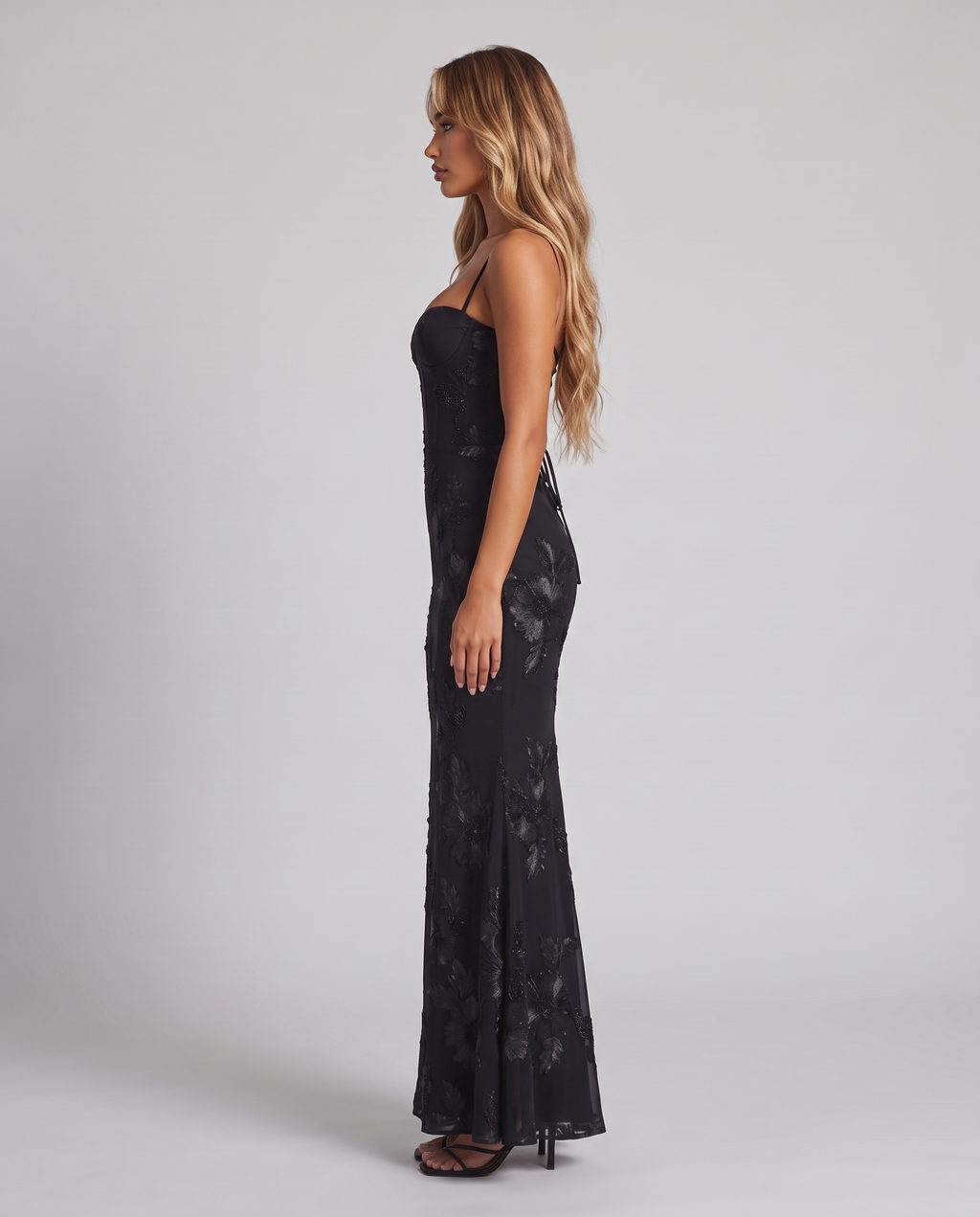 Black floral embroidered corset maxi dress with open back, side view