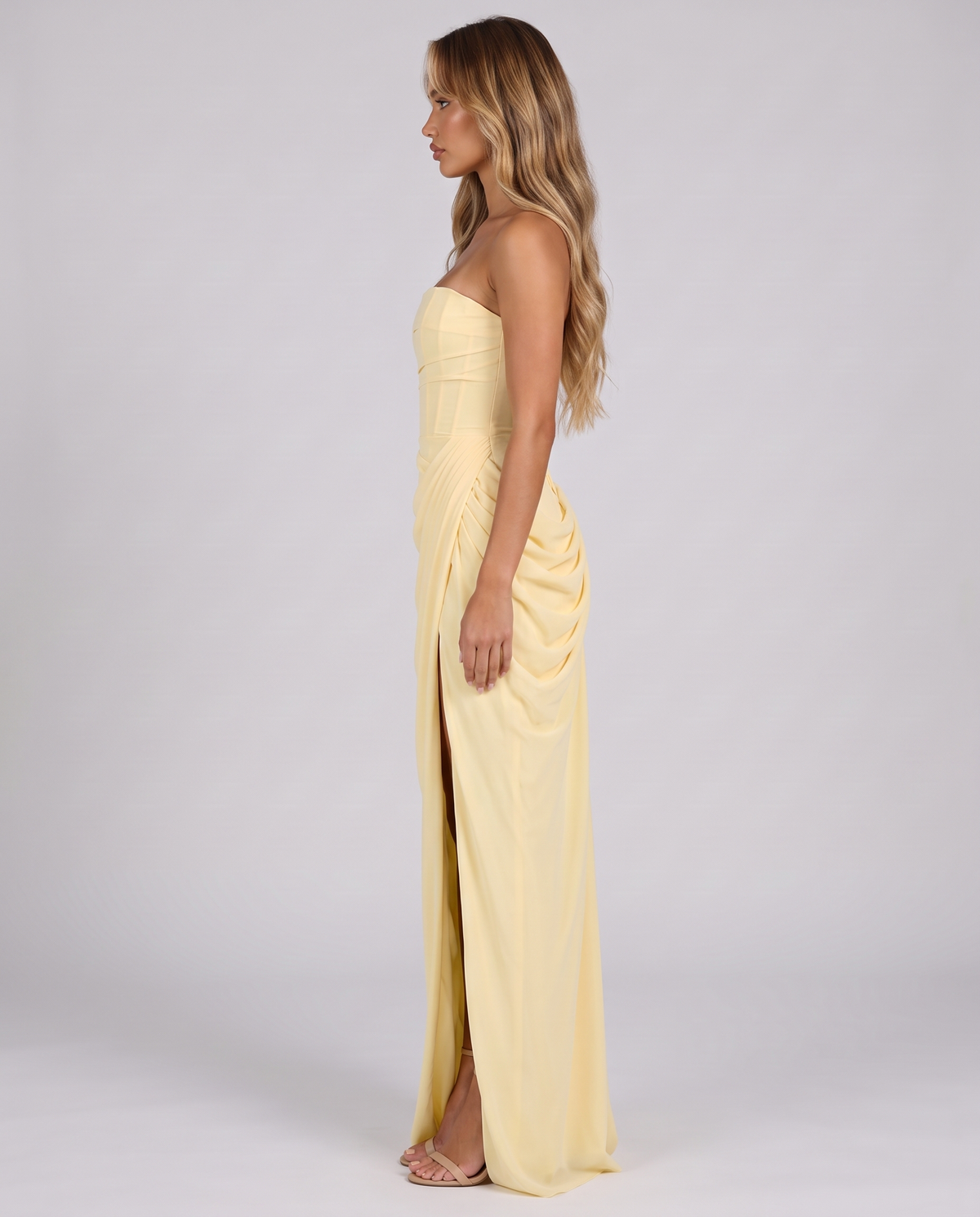 Lemon strapless ruched maxi dress with high slit, side view