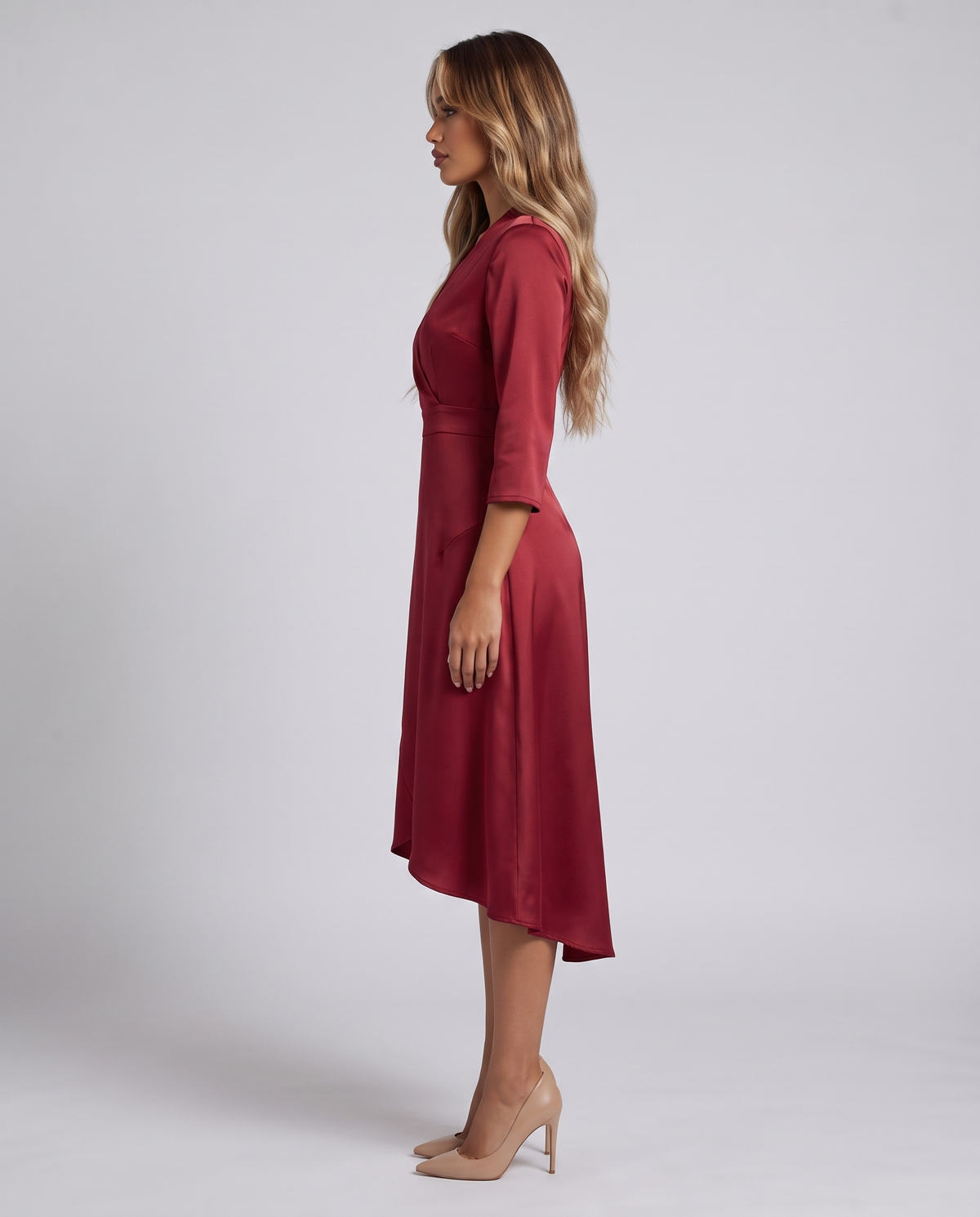 Wine red satin wrap midi dress, side view showing the high-low hem