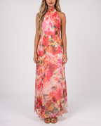 Pink and coral floral halter neck maxi wedding guest gown, front view