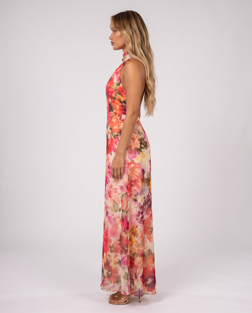 Pink and coral floral halter maxi gown, side view