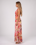 Pink and coral floral halter maxi gown, side view