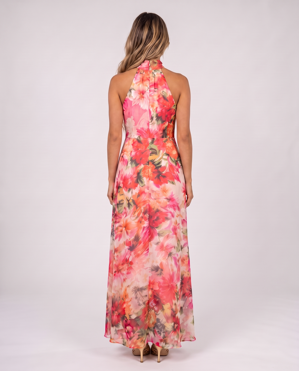 Pink and coral floral halter maxi gown, back view with bare shoulders