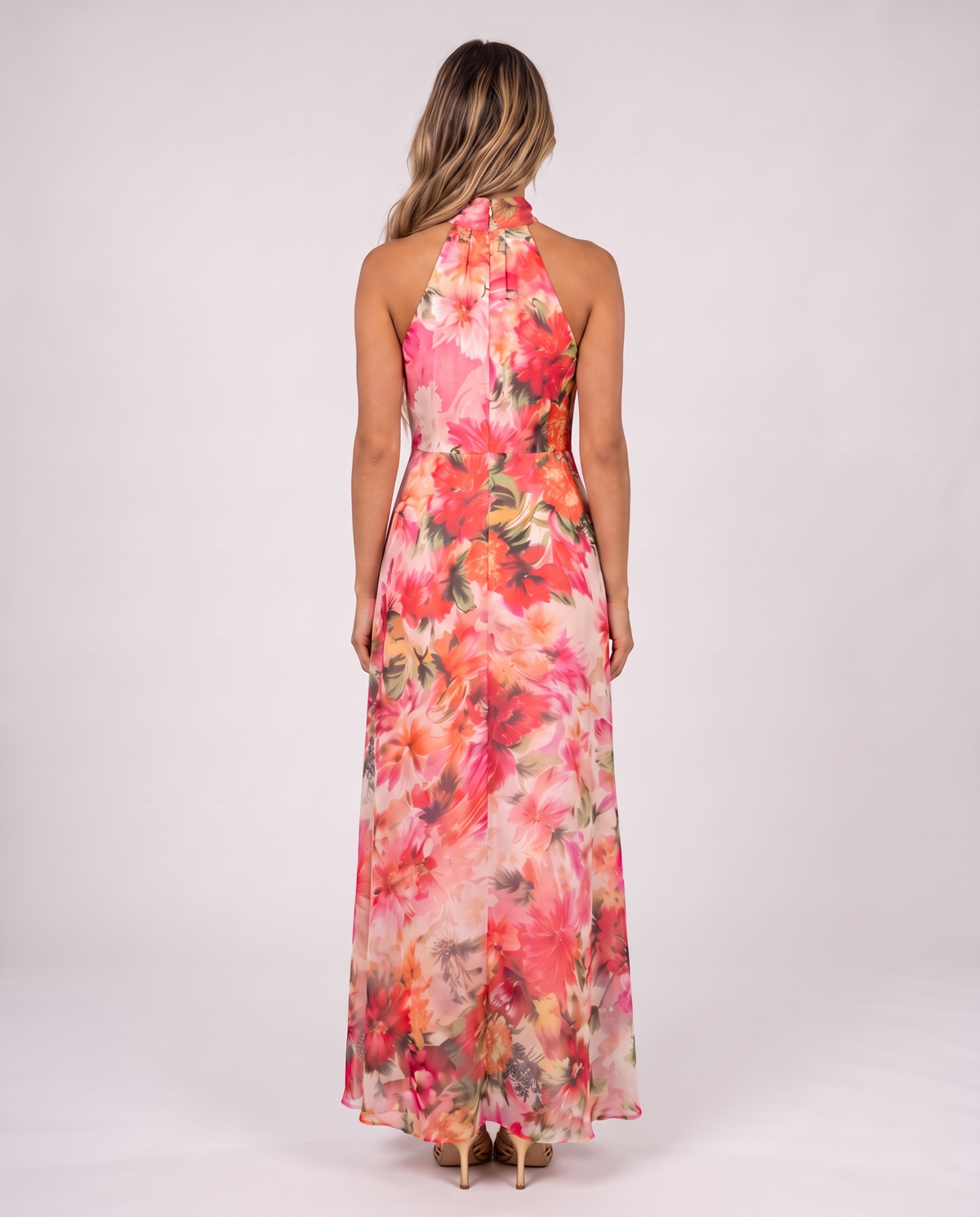 Pink and coral floral halter maxi gown, back view with bare shoulders